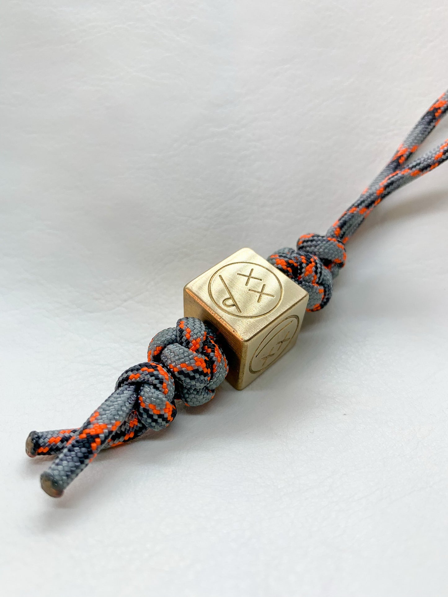 Knife Lanyard Bead Cube Sad Face Polished Brass