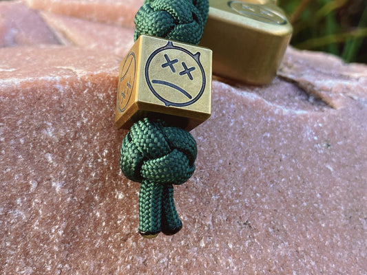 Paracord Bead Cube Sad Face Stonewashed Brass