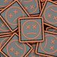 PVC Velcro Patch Sad Face Dark Grey and Orange